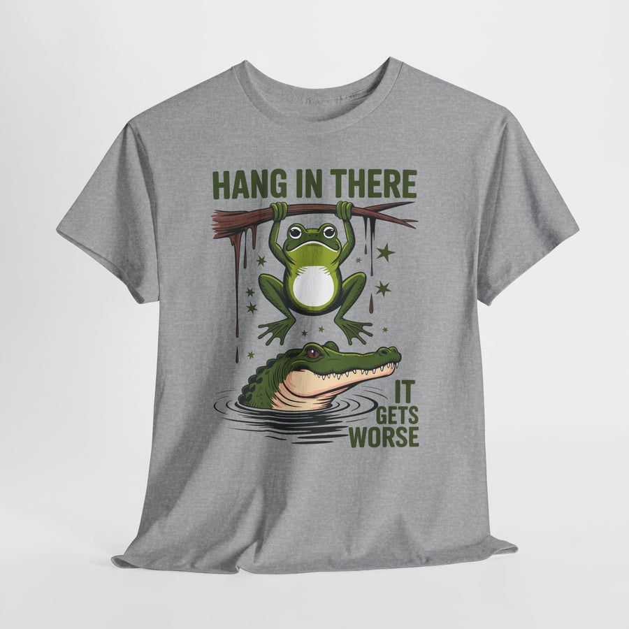 Gray t-shirt with a graphic of a frog and alligator and text 'Hang in there, it gets worse' on a white background.