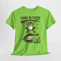 Green t-shirt with a graphic of a frog and alligator and text 'Hang in there, it gets worse' on a white background.