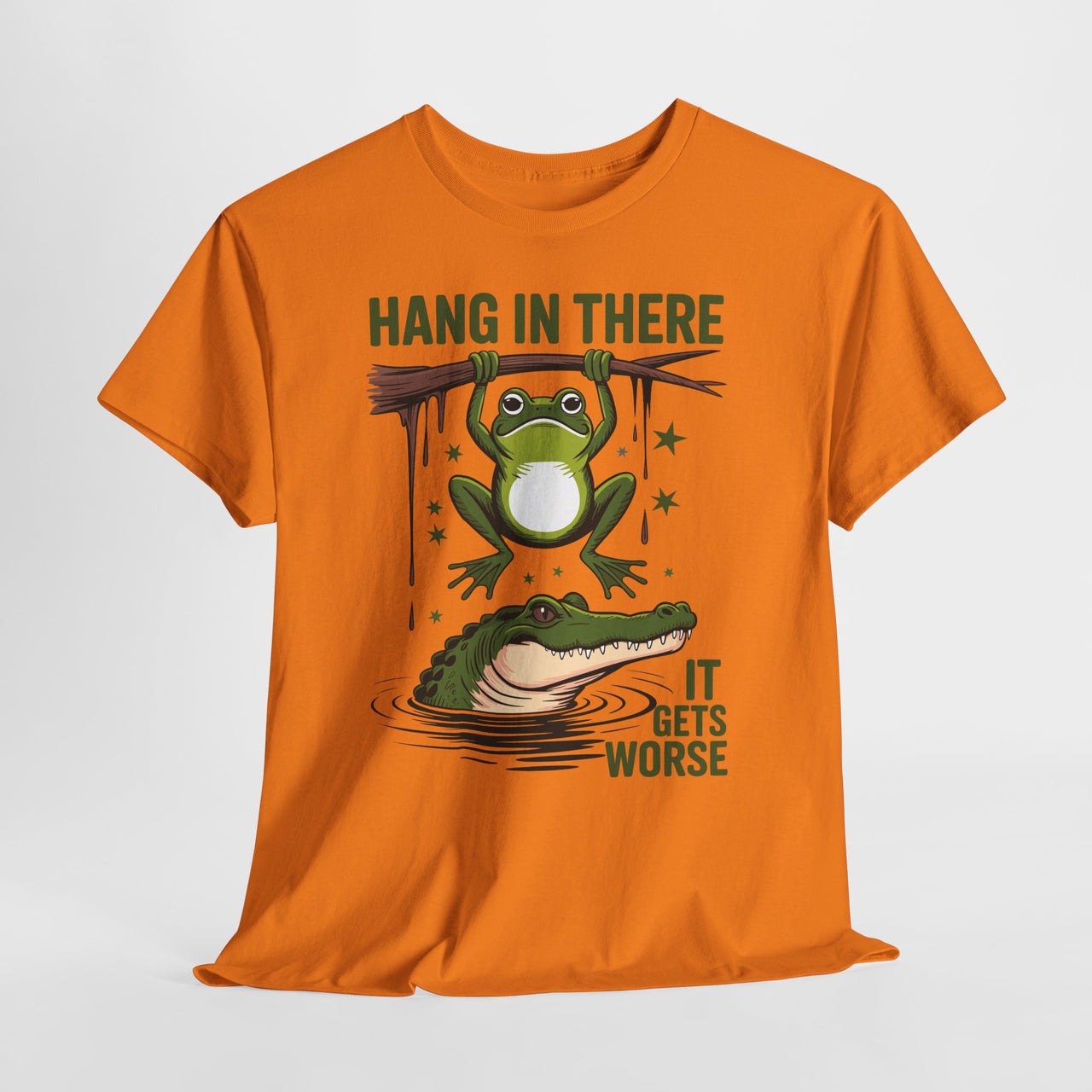 Orange t-shirt with a graphic of a frog and alligator and text 'Hang in there, it gets worse' on a white background.